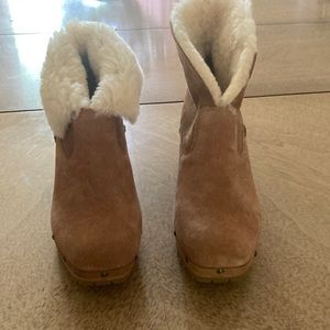 NWOT Brand new Ugg shearling boots with rivets and lug sole.